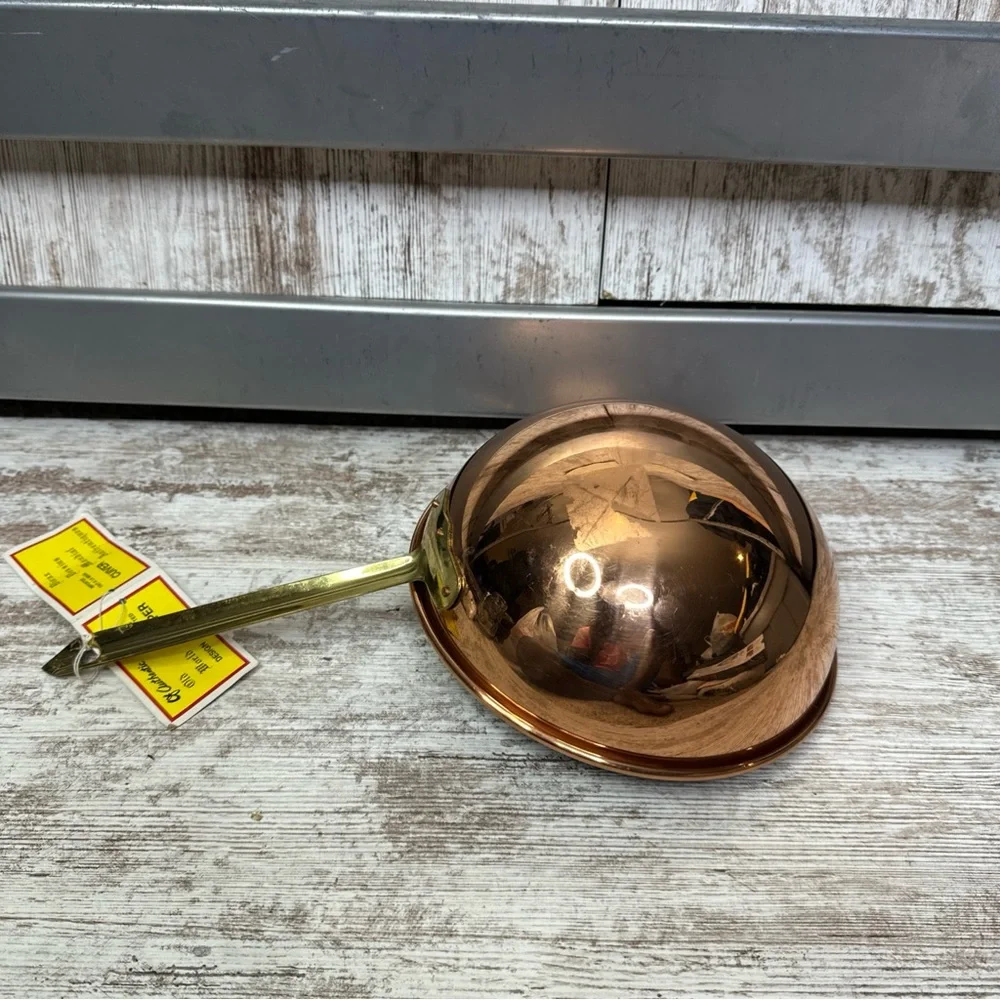Copper pan or decorative bowl.